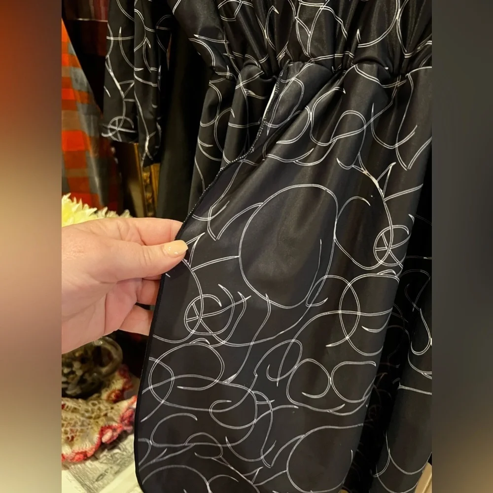 The Swim Dress is a full-coverage swimsuit XL (18/20)